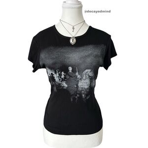 Y2K “Bellagio” Black & Grey Cirque du Soleil Graphic Short Sleeve Baby Tee